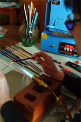 Sue making lampwork beads