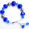Hand made bracelet with handmade lampwork beads and fair trade hill tribe silver beads