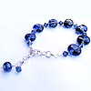 Navy storm bracelet handmade with lampworked beads and swarovski crystal pearls and crystal earrings
